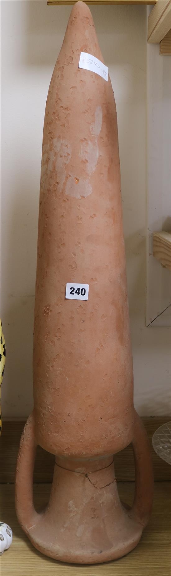 A terracotta two handled amphora 80cm.
